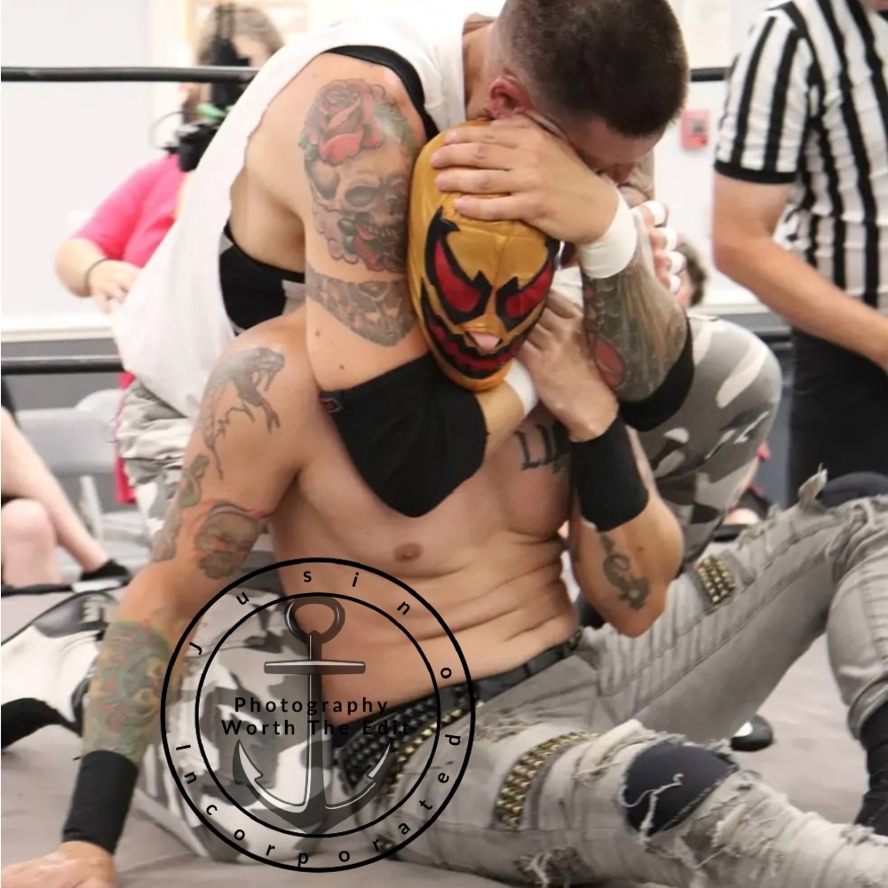 2 men wresting each other photography